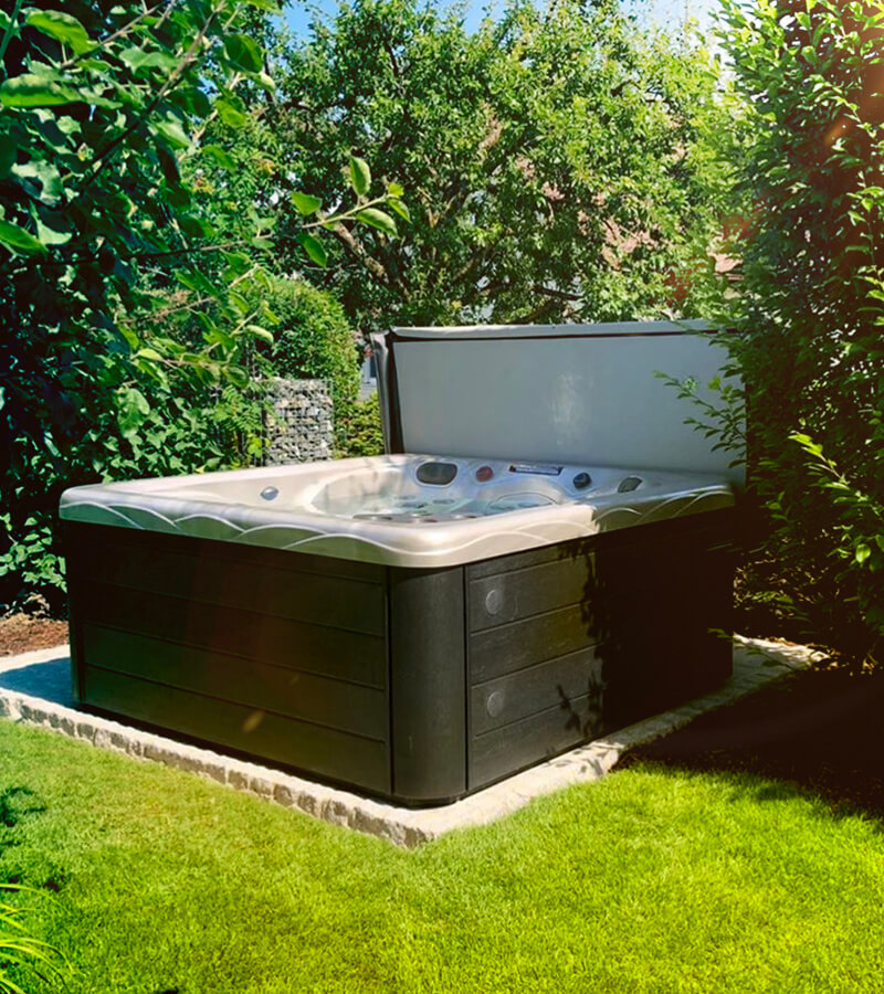The best foundation for a hot tub is a reinforced concrete pad